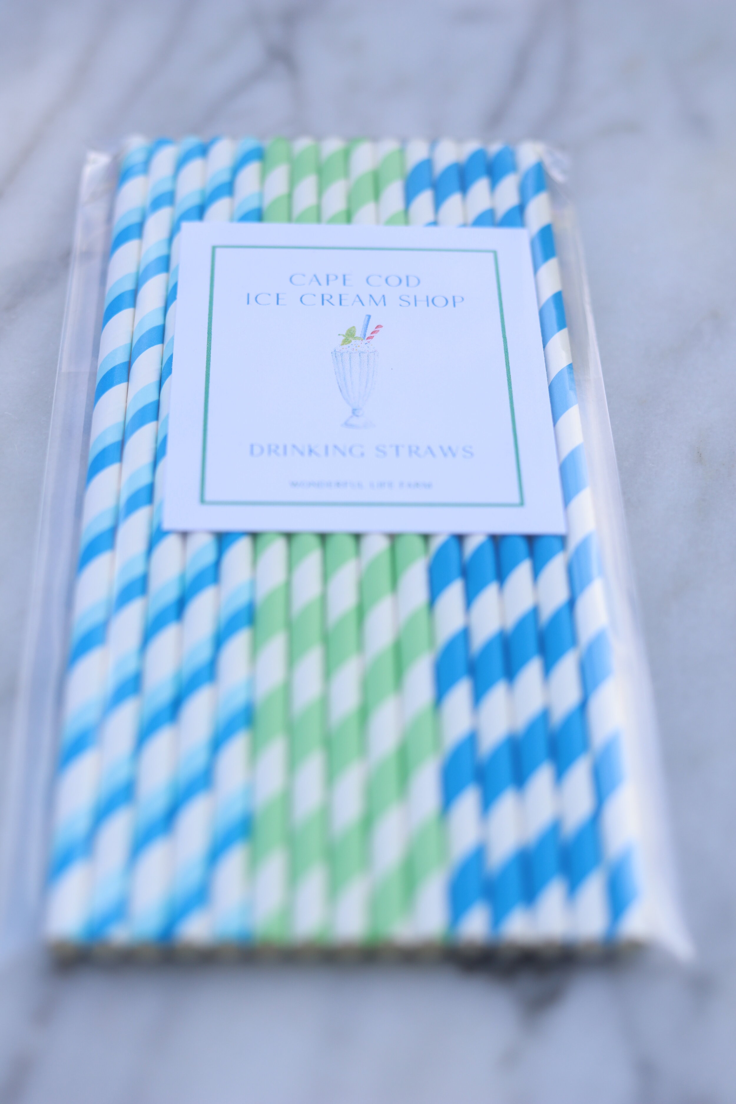 blue and green striped paper drinking straws