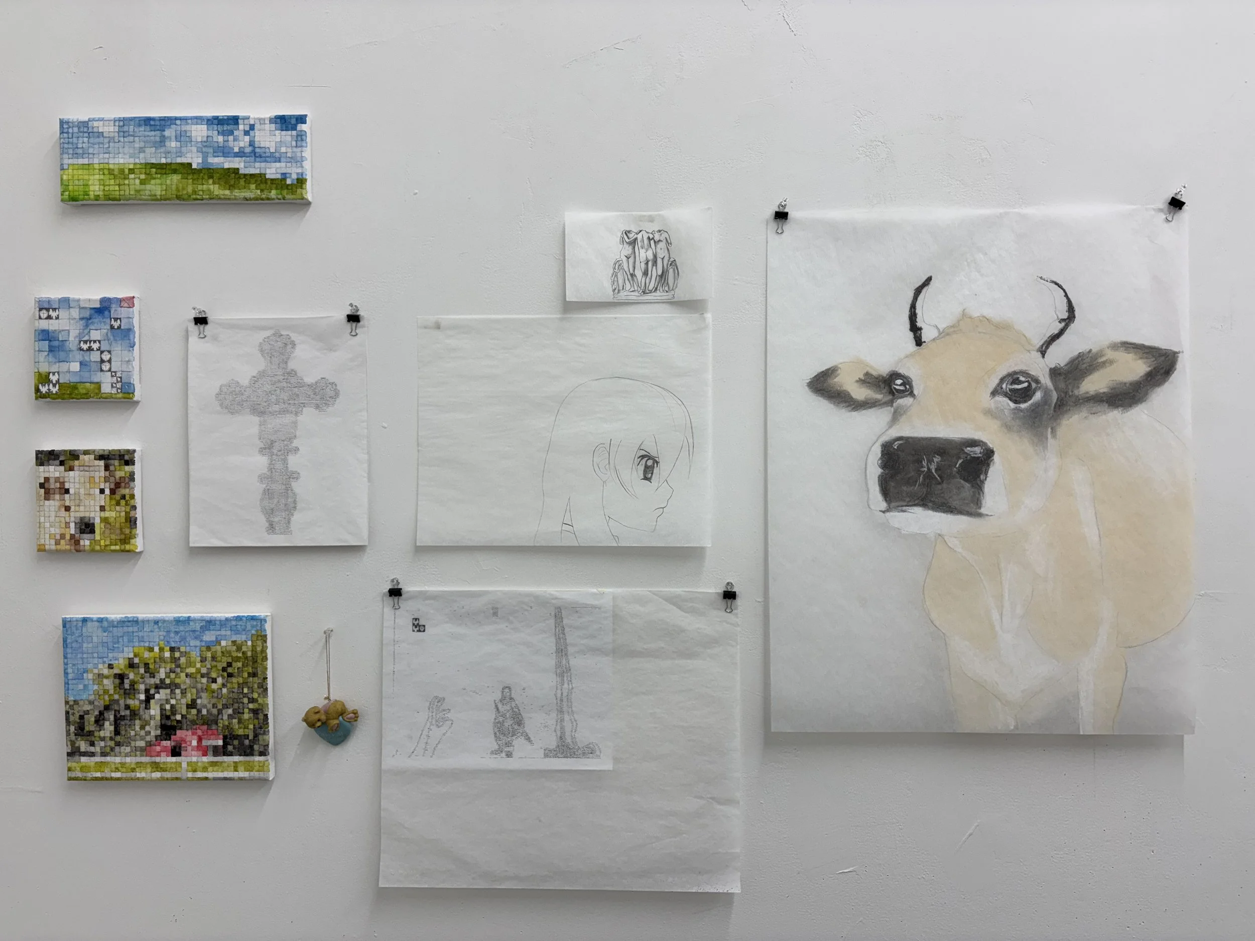 studio wall feat. small scale pixel paintings (left) ∷ ascii drawings (middle) ∷ bitsy, 18 x 24 in, chalk on paper (right)