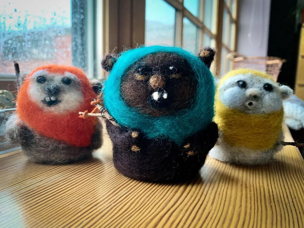 May The 4th Be With You. ✌🏻 ⁣
⁣
I made the newest little Ewok in the middle for Kevin ... back at Christmas ... and never shared him with y&rsquo;all! His wee little slingshot might be my favorite part 😆⁣
⁣
#ewok #ewoks #ewokcrafts #starwarscrafts 