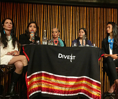  Indigenous Women’s Divestment Delegation presenting at a public event in Oslo, Norway - Photo via WECAN International 