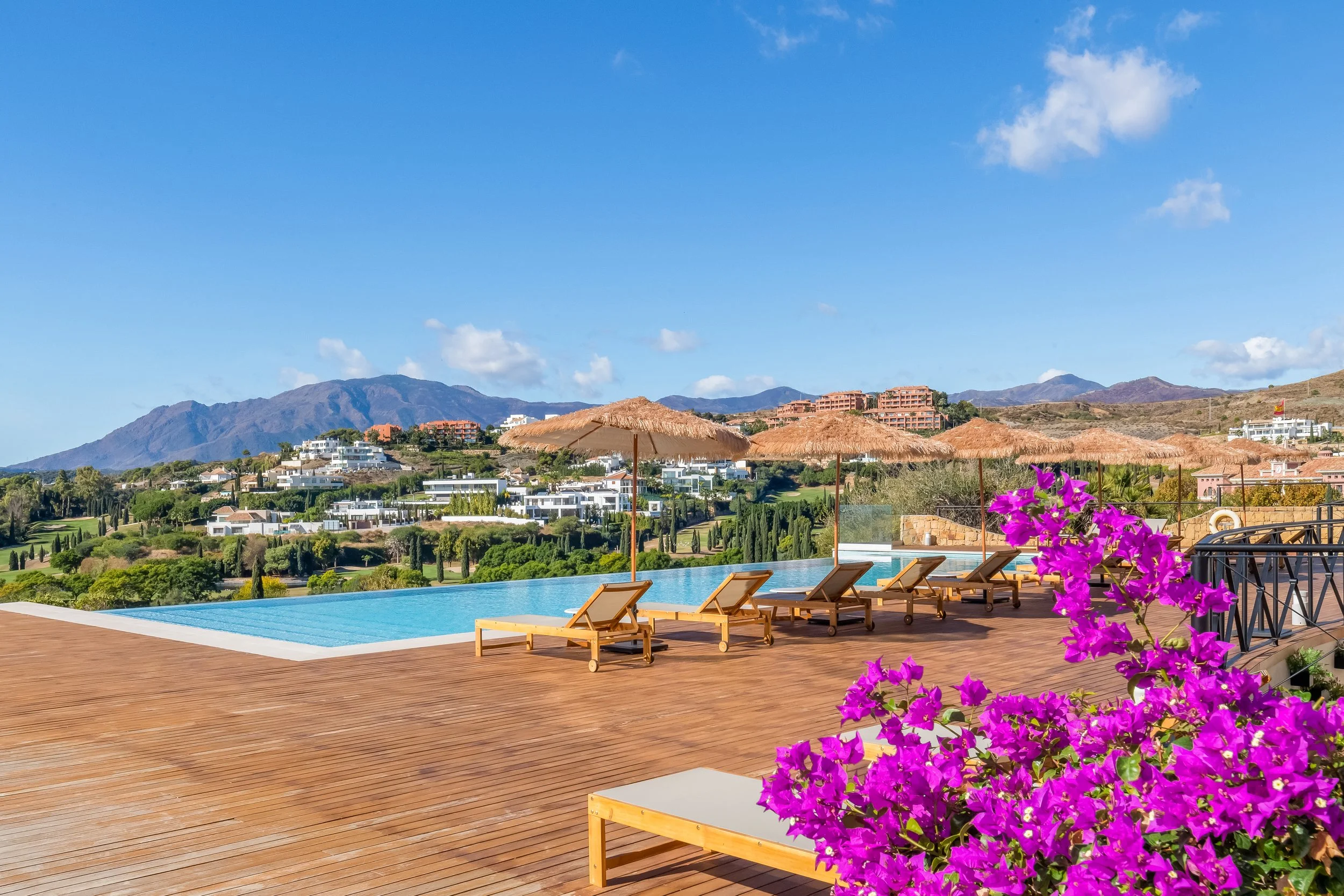purple flowers and pool in marbella