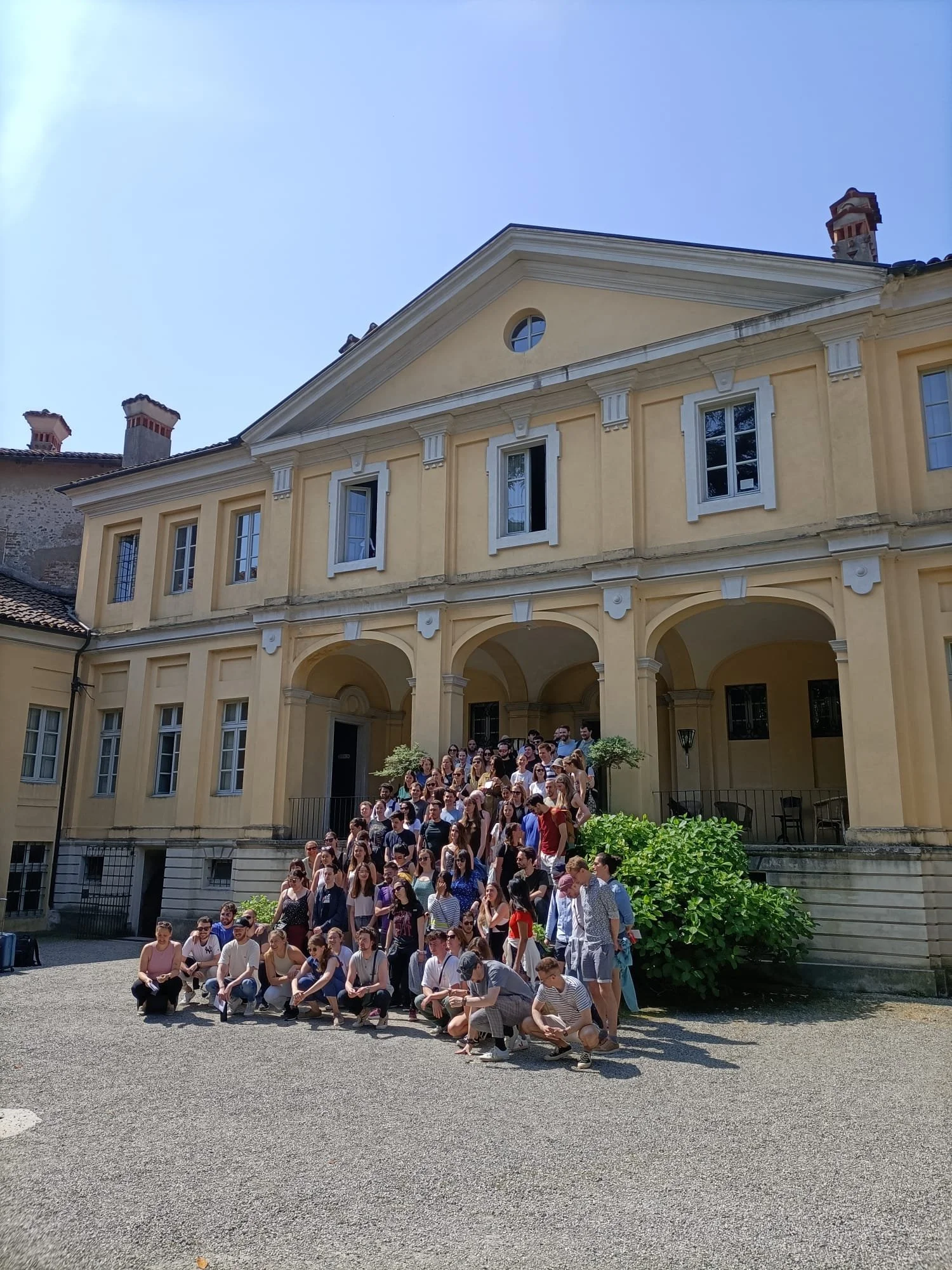 outside castle estate in italy for team meeting