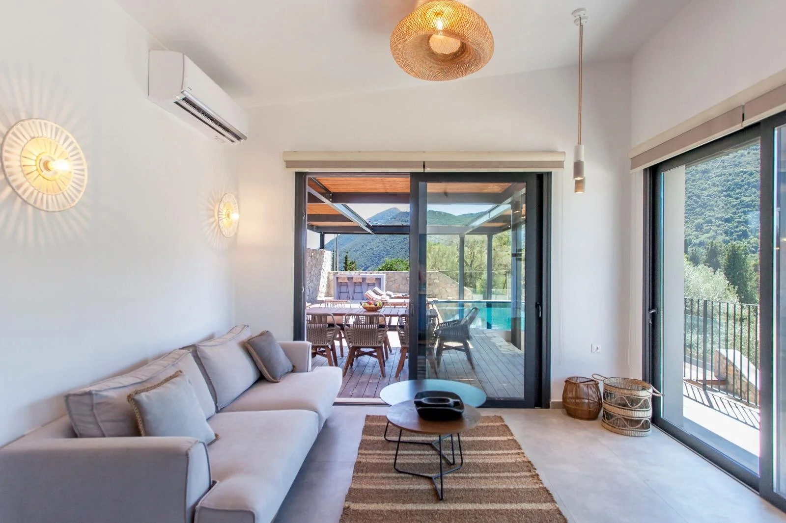 sofa overlooking pool