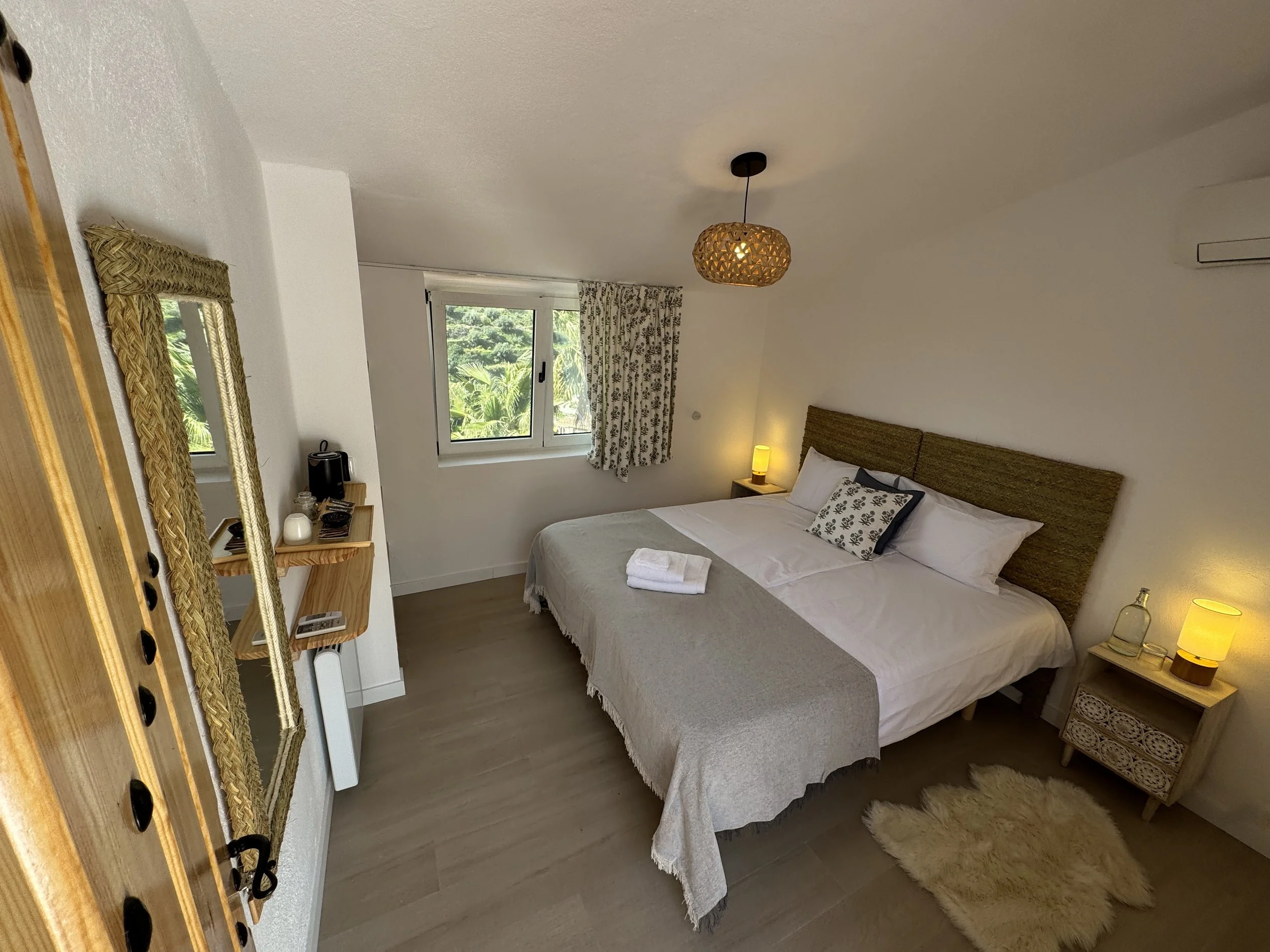 bedroom with grey sheets