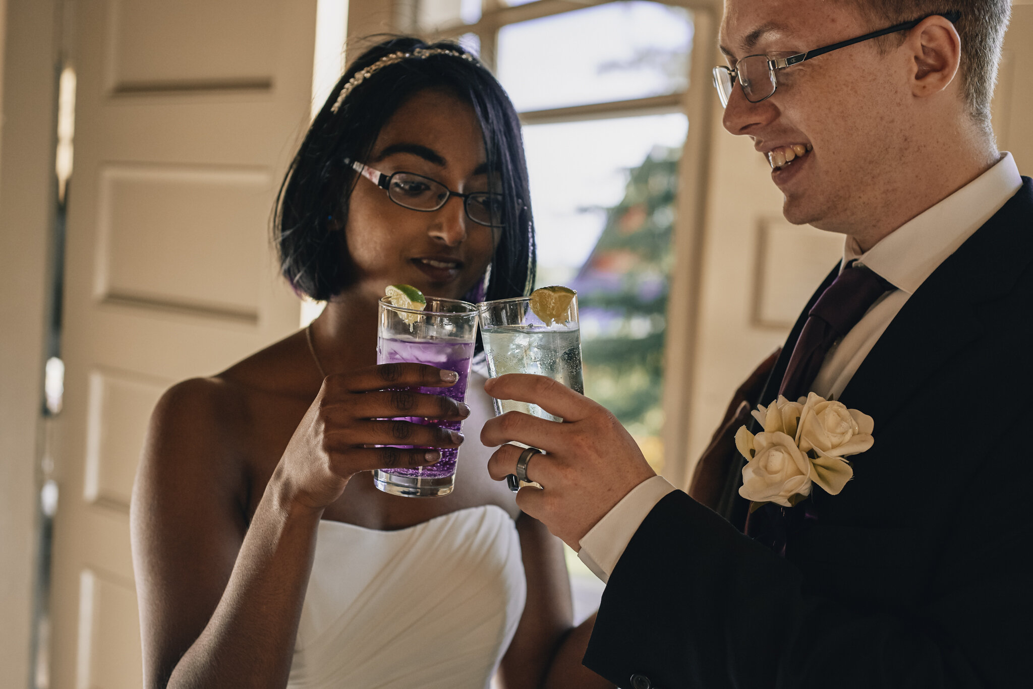  The happy couple had custom cocktails each. One purple, and one green to match their wedding colours. 