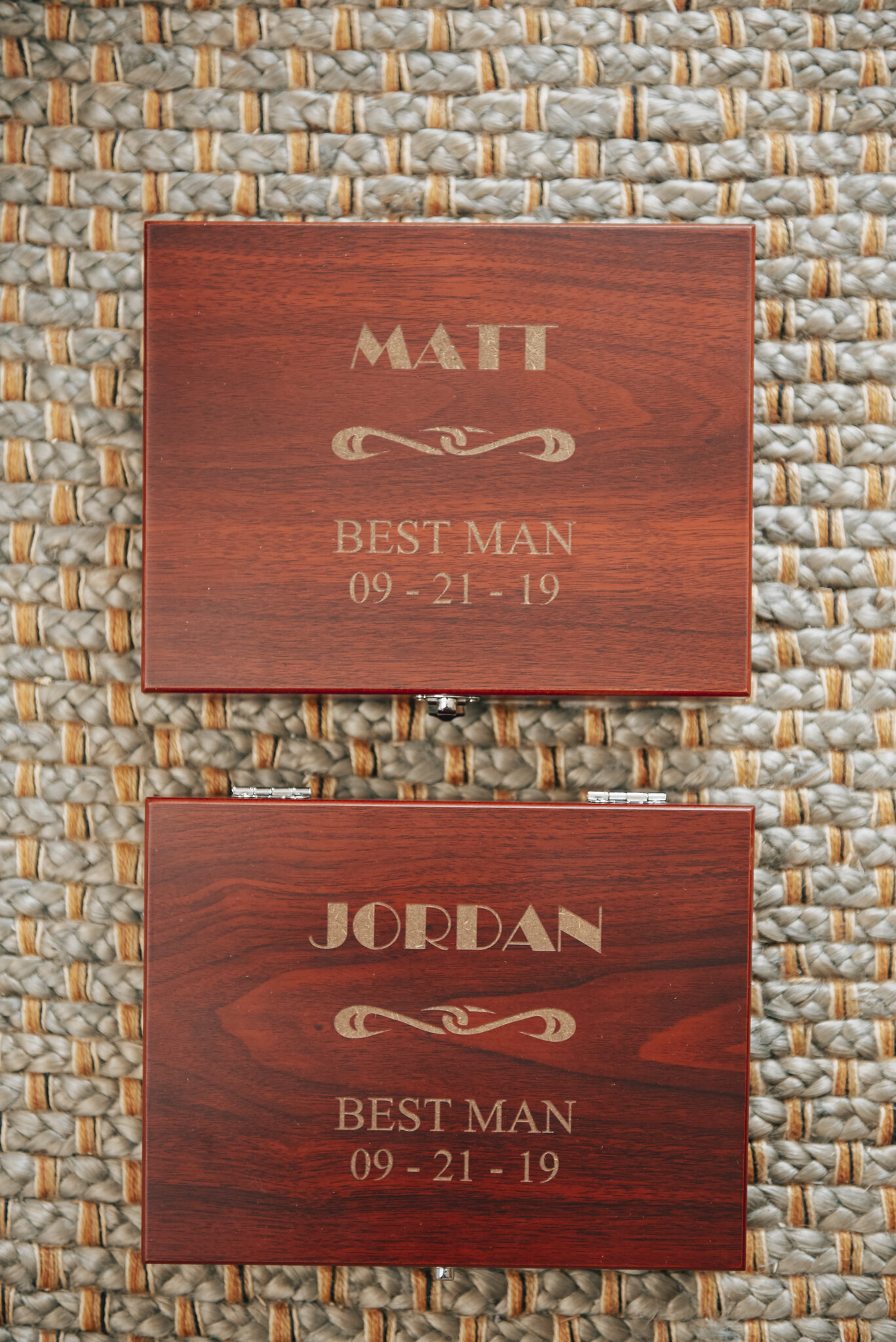  Custom gift boxes for the groomsmen. Inside were wallets and knives with the guys’ names on them. 