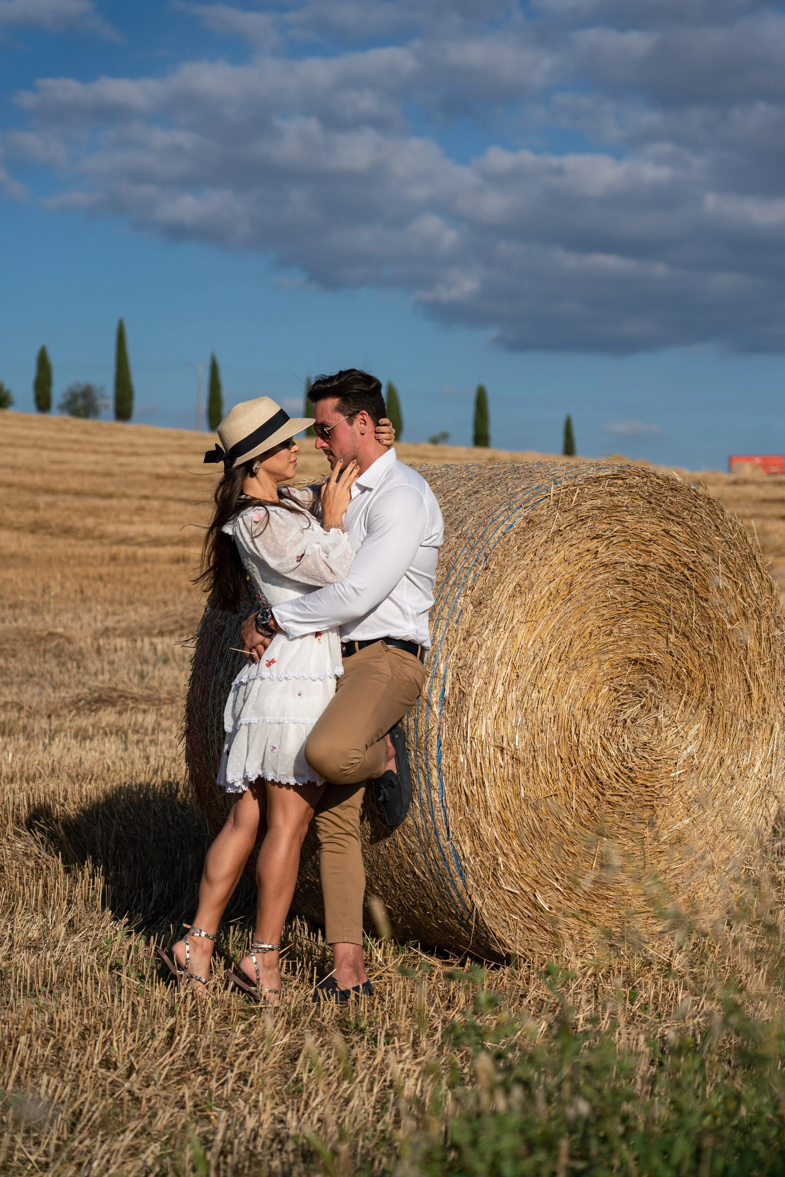 romantic couple countryside hills in Tuscany