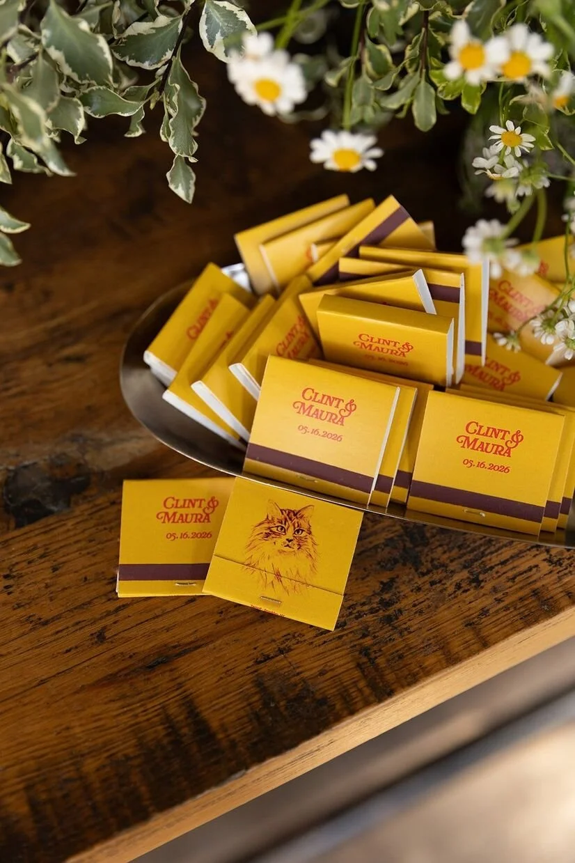 Custom matchbox with cat face on it at The Goodyear House wedding in Charlotte