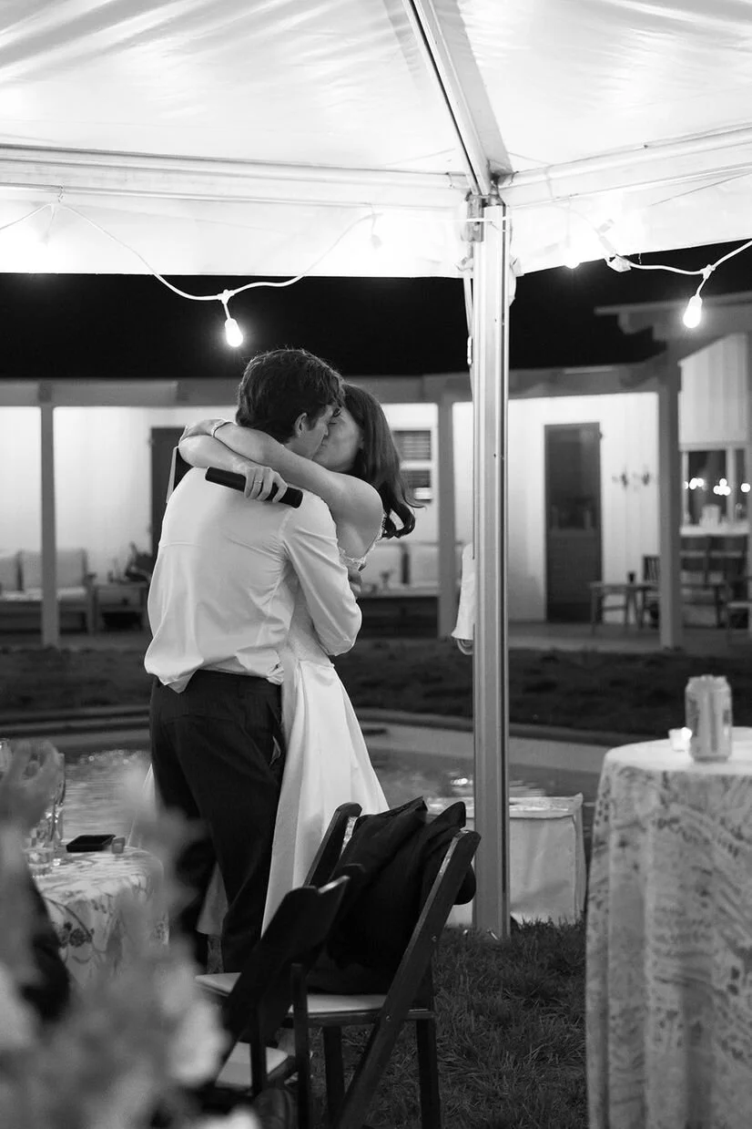 Bridge and groom kissing after sharing vows with one another at a micro wedding in North Carolina