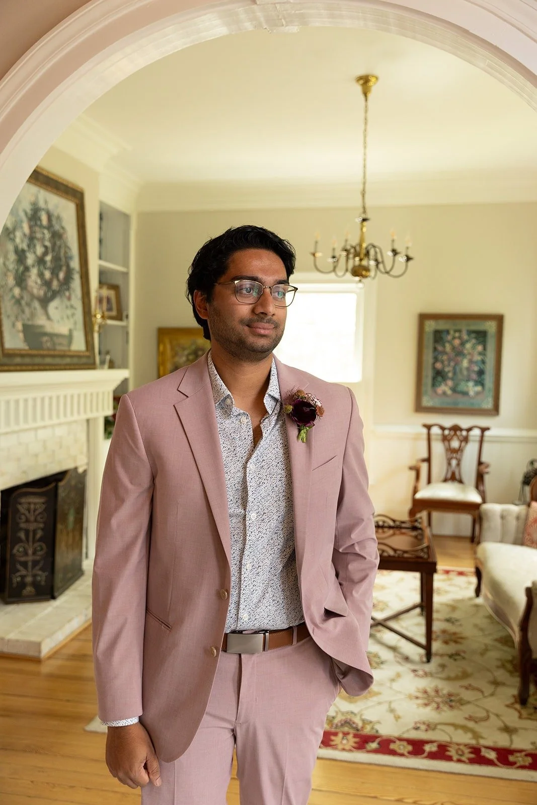 Groom posing before ceremony inside the mansion at The Matthews House in Cary, NC.