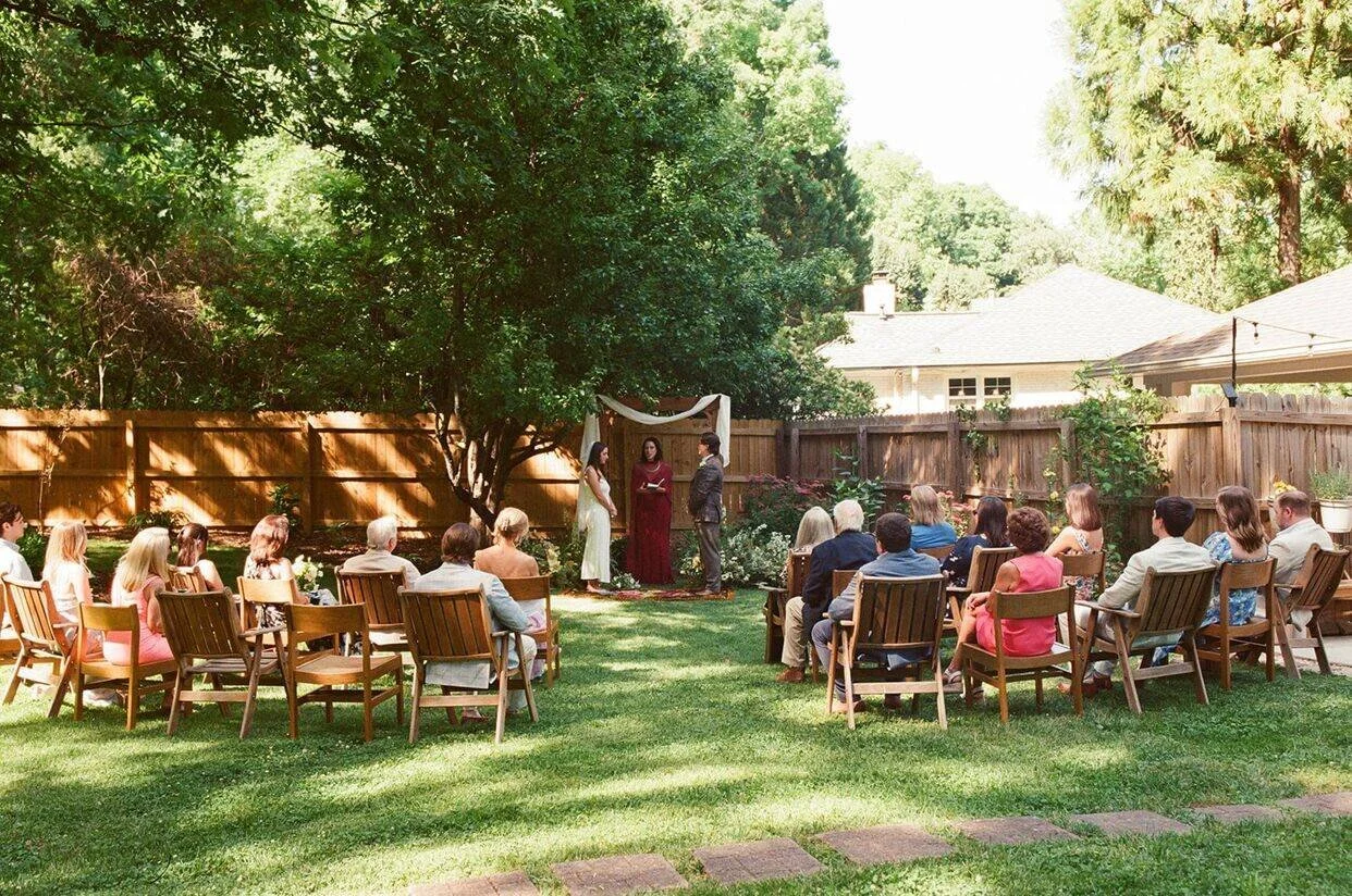 Couple getting married in backyard for Goodyear House Charlotte wedding