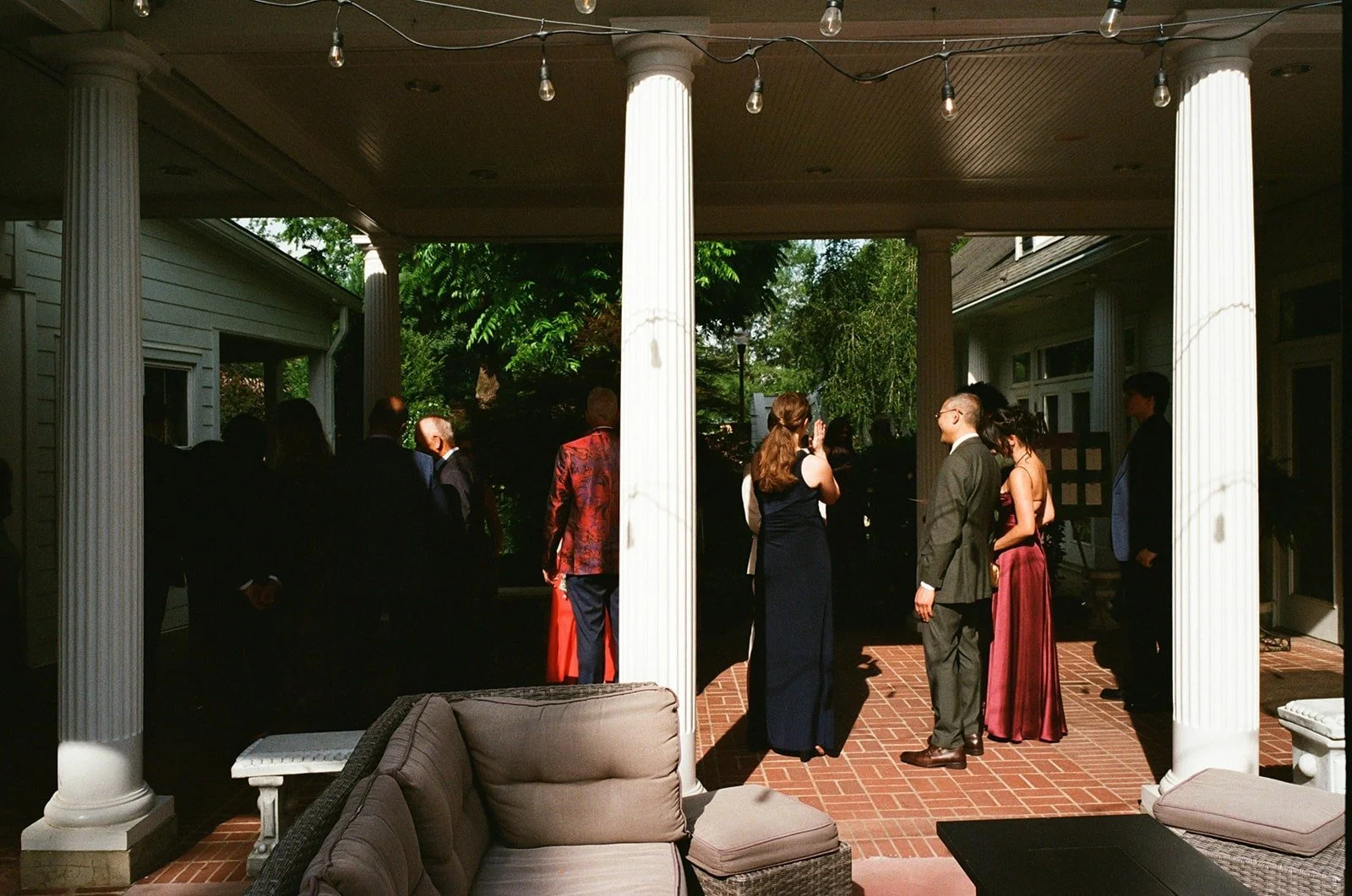 Guests mingling at a reception at The Matthews House in Cary, NC