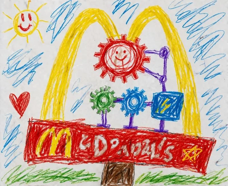 Crayon drawing of McDonald's golden arches and gears