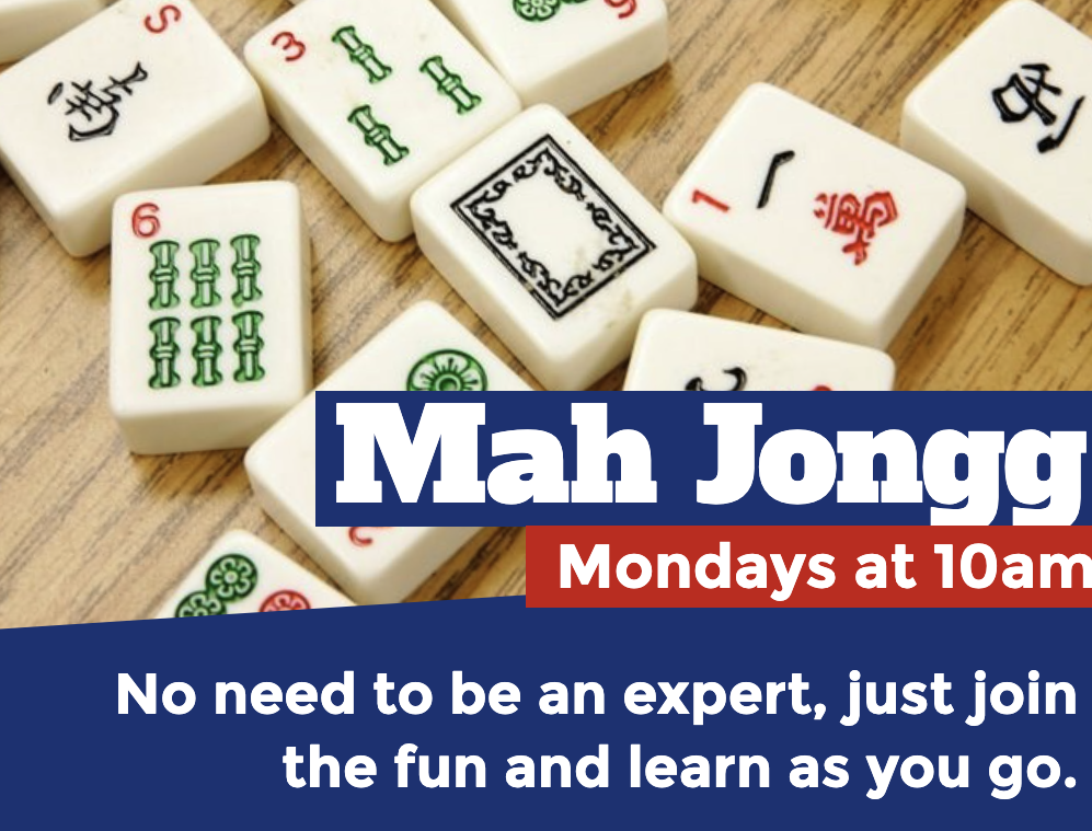 Mah Jongg tiles scattered on a wooden surface with blue and red banners at the bottom.