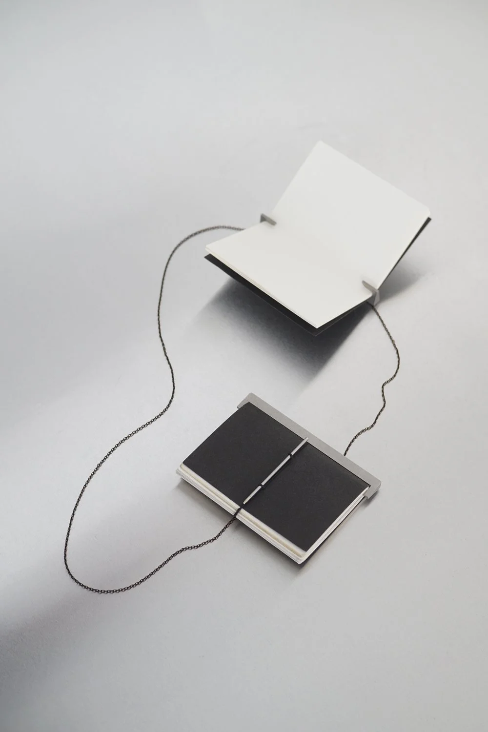 2 × A6 FOLDBOOK + [ CHAIN ] + [ 2 × A6 REFILL _ 3–SETS ]