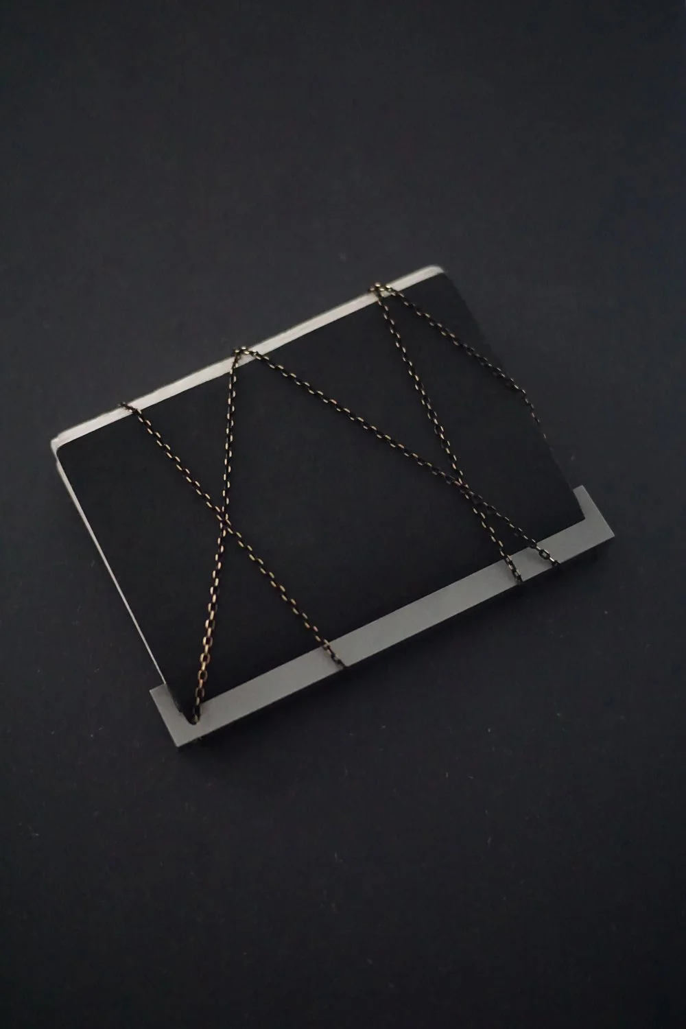 A6-closed-with-chain--_--IMAGE-2--_--FOLDBOOK-by-ERLANDS-.jpg
