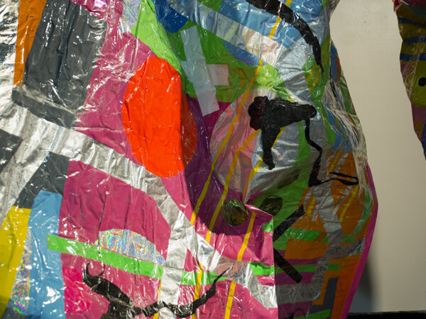 Detail: Tabled # 3, 2016.
Reclaimed plastics, adhesive tapes, vinyl, found objects and stretch wrap, 2500 x 3000 x 1900mm.