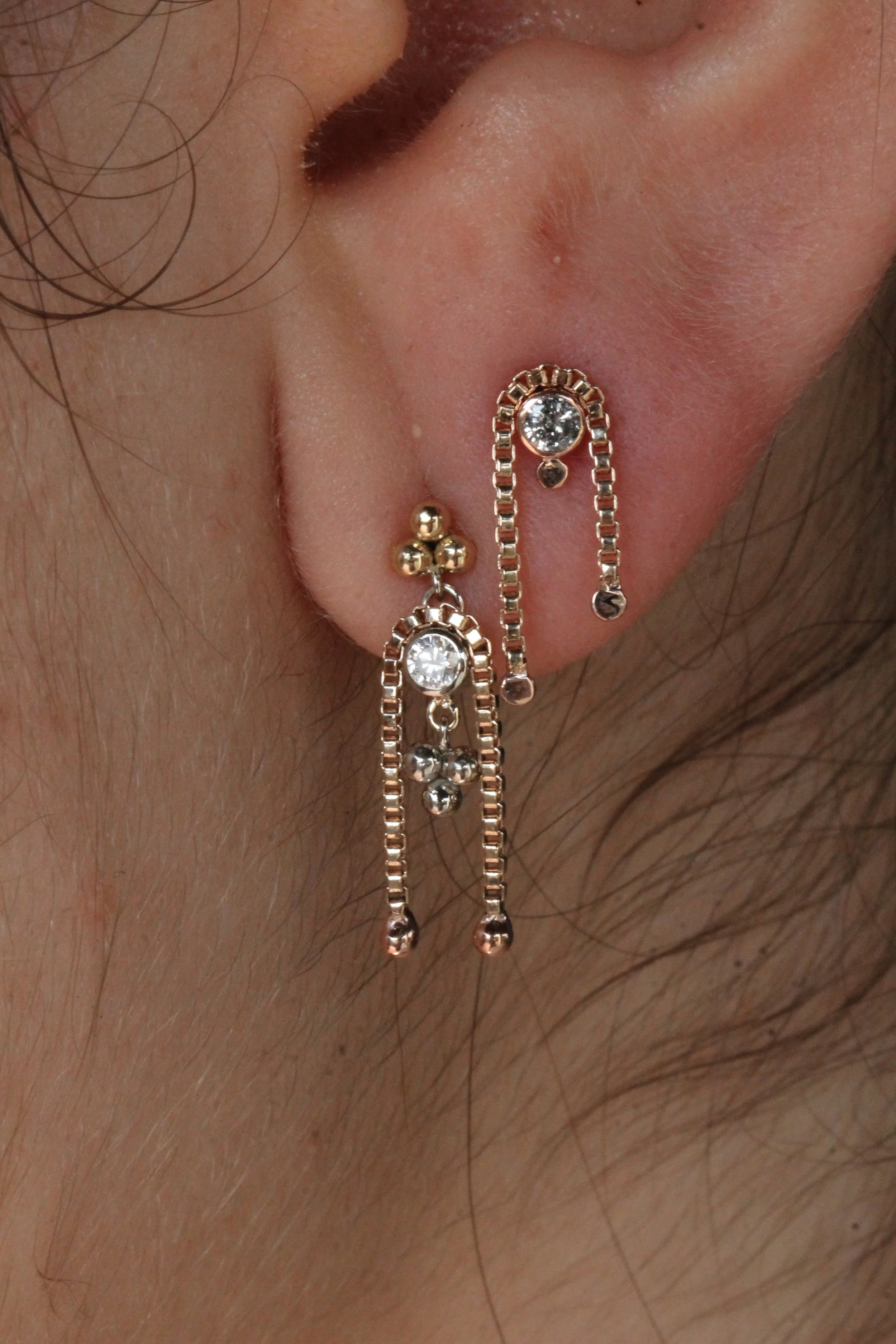 piercing dangle with diamonds