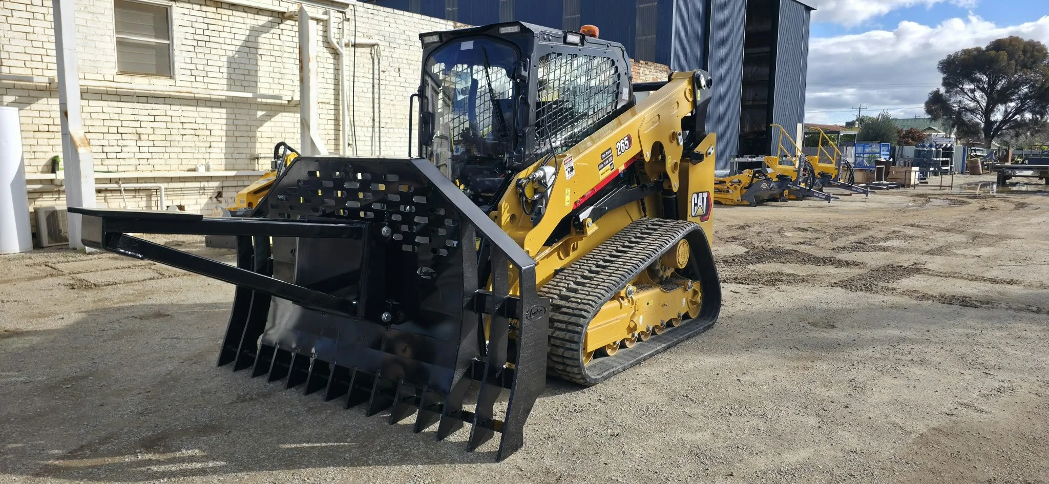 Stick rake on new CAT 265 forestry model