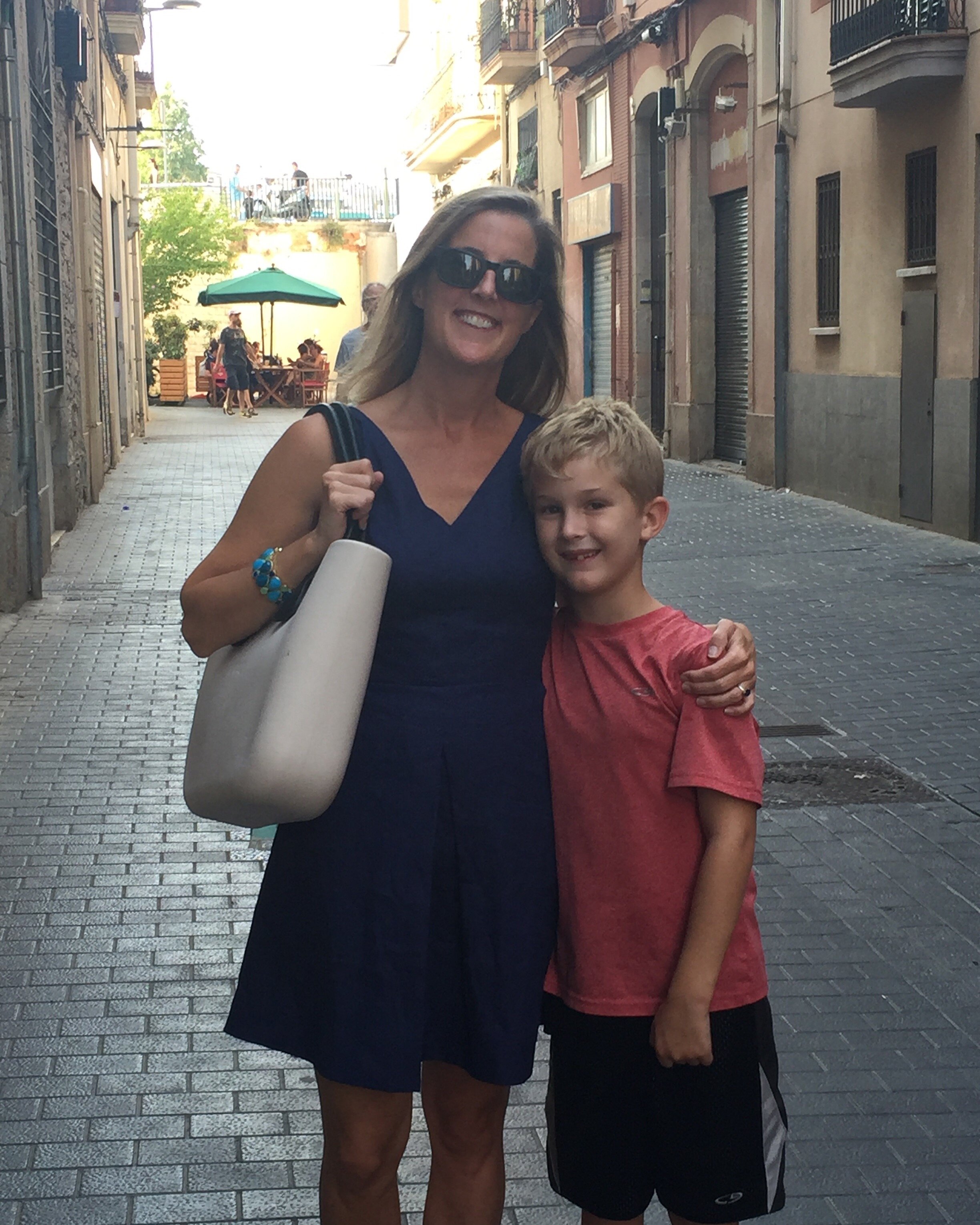 Happiness in a Barcelona street. I bought this fake bag from a street vendor, just like Charlotte thinks of doing on her day tour.