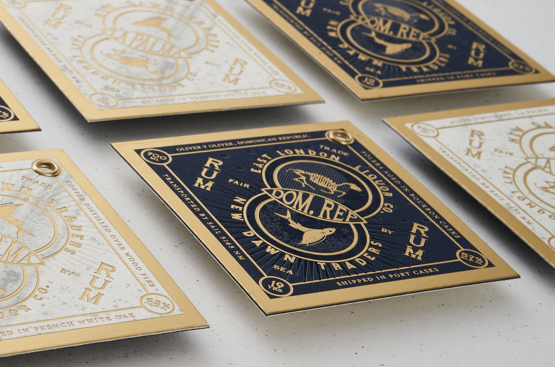 Bottle Neck Tag with Gold Foil and Eyelet.png