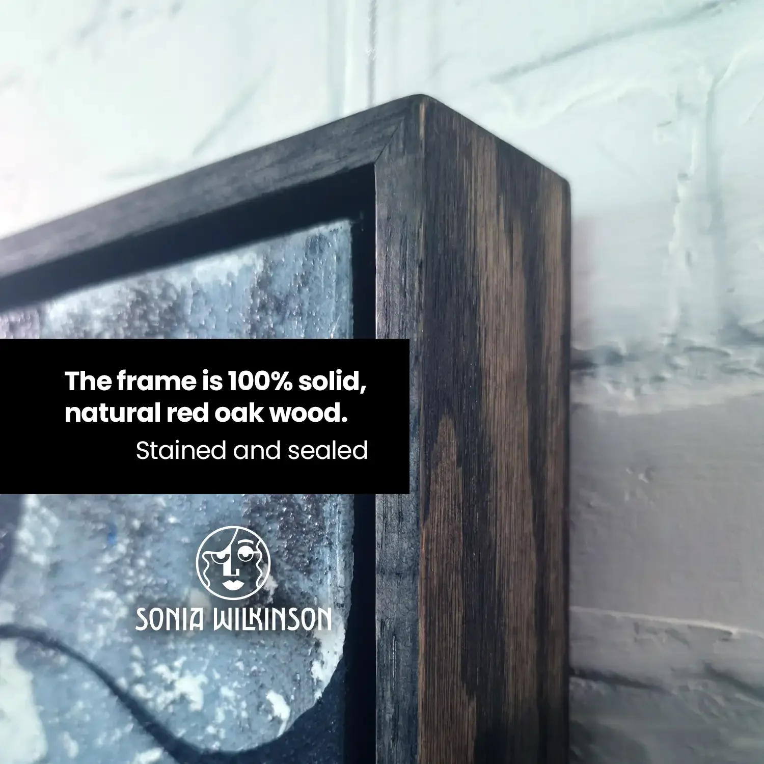 The frame is made of solid red oak, stained and sealed.