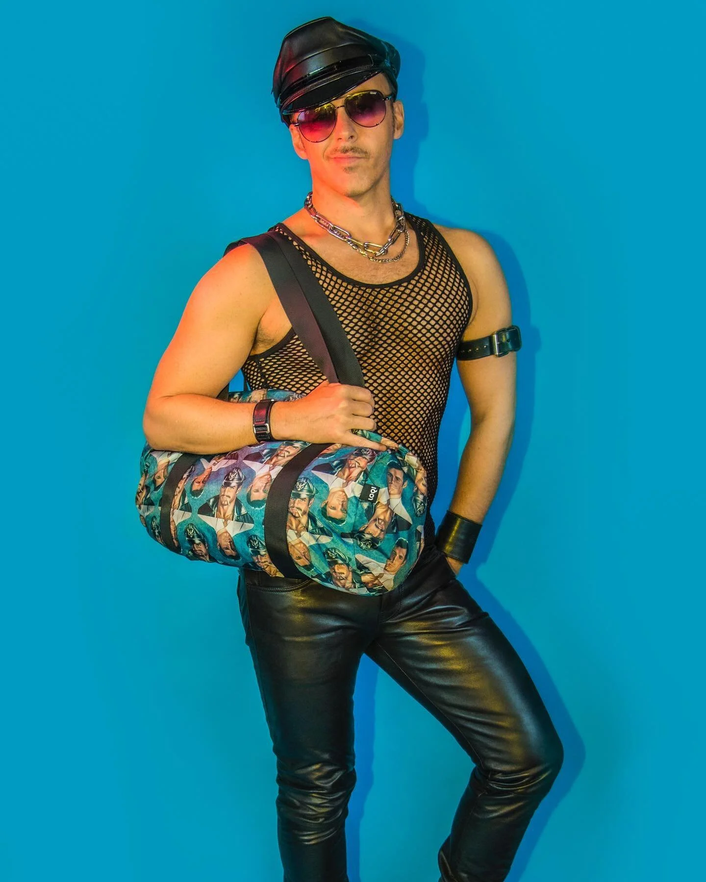 Take a trip with Tom of Finland with the luxury DAY/NIGHT duffle.  Made from 100% recycled material, this bag is functional, fun, and sexy as hell. It features Tom&rsquo;s famous day/night image, which looks like #henrycavill dressed as a #Leatherman