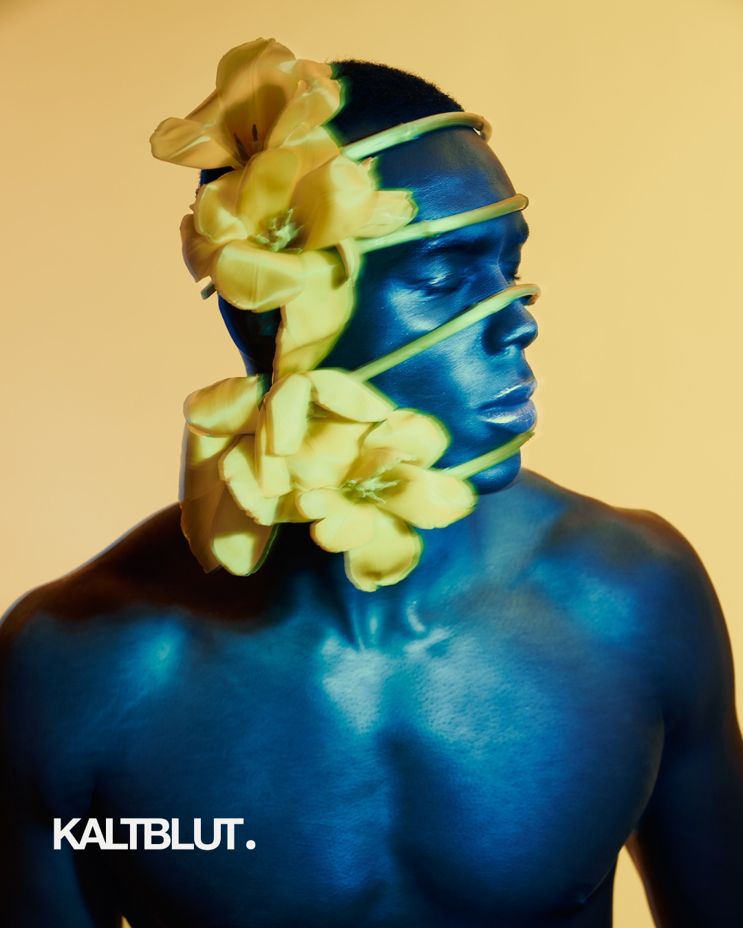 Artistic fashion portrait of Black male model with blue light and yellow flowers wrapped around head, vibrant color contrast, avant-garde editorial photography