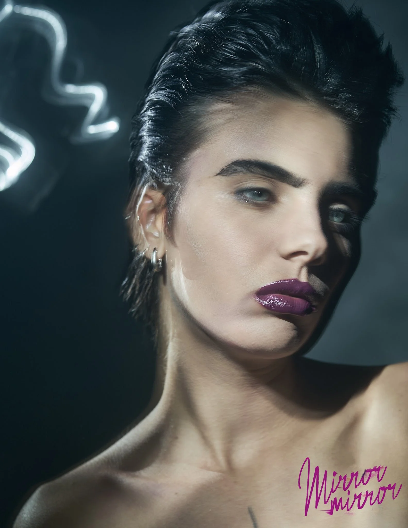 Experimental beauty portrait with bold lipstick and dramatic lighting. Shot by Belgian fashion photographer Simon Rogghe using light painting techniques.
