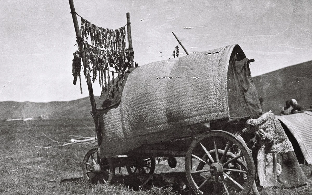  Travellers drying meat on cart shafts, Barga, N. Manchuria/Holmes 
