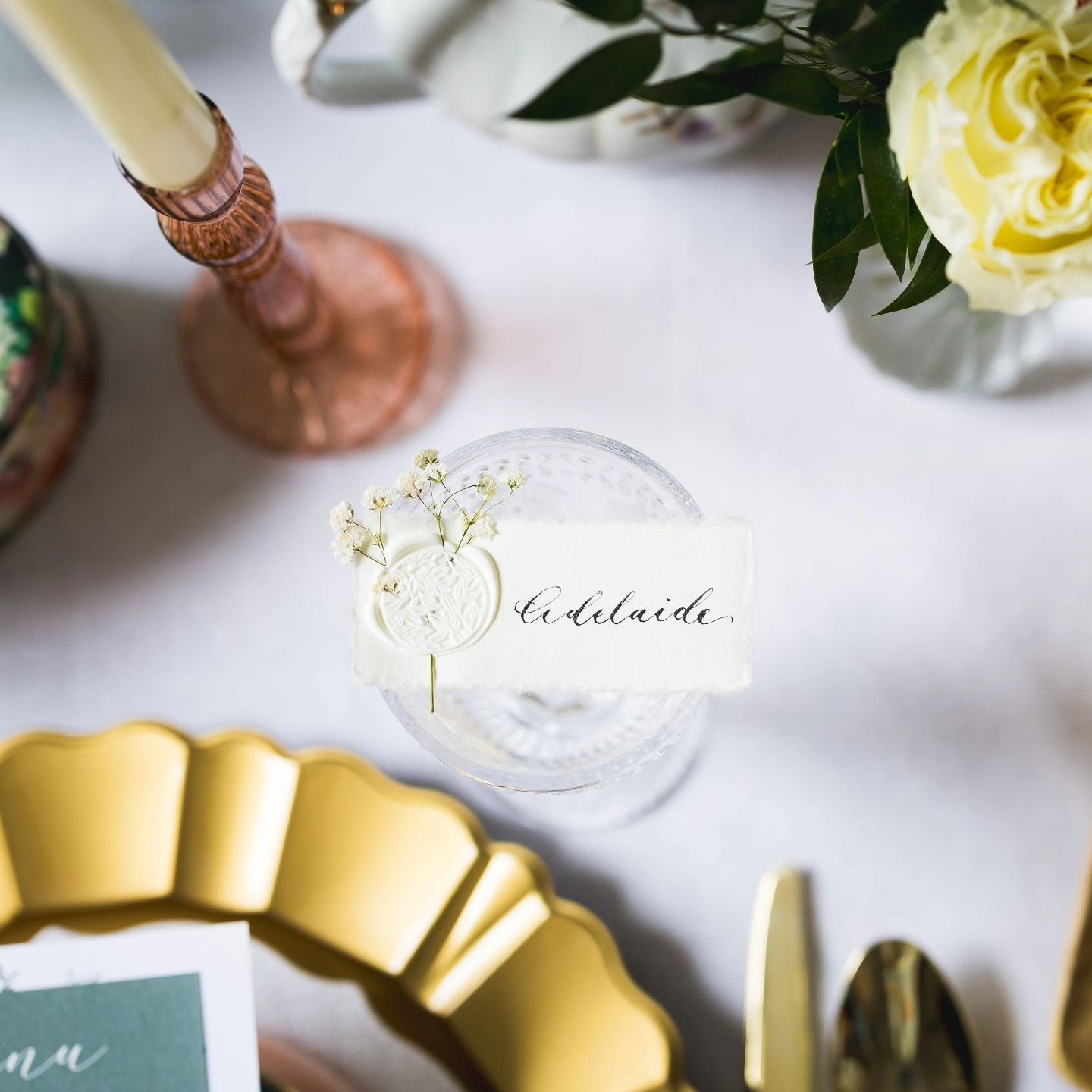 Custom-made namecards for this High Tea tablescape. 

I love incorporating natural and themed elements into my designs. It was so fun getting to play with flowers and wax seals again. An easy, classic way to style your table and add that extra specia