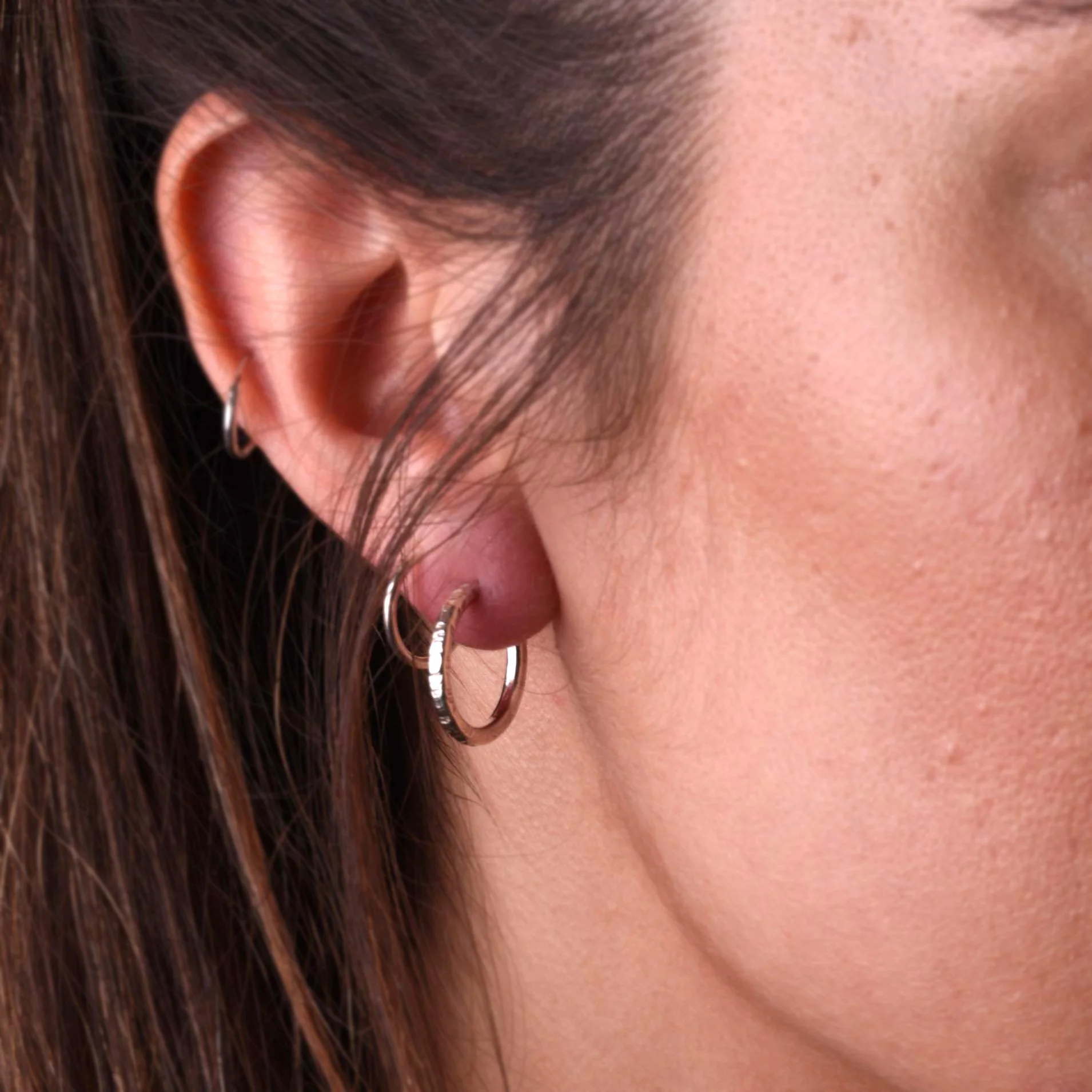 Linear Everyday Hoops silver in ear.jpg