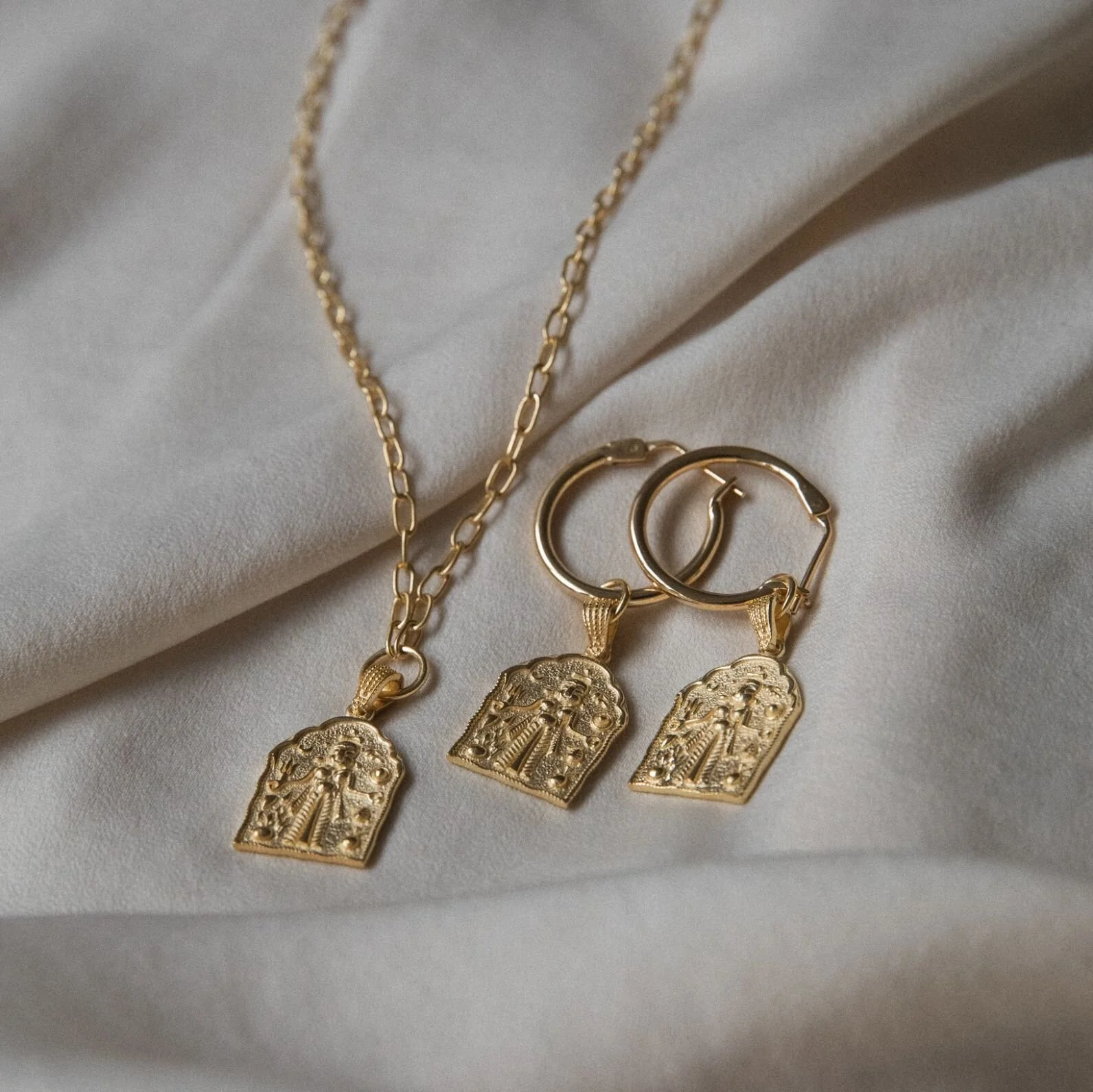 SC Kali Amulet set gold on silk.jpg