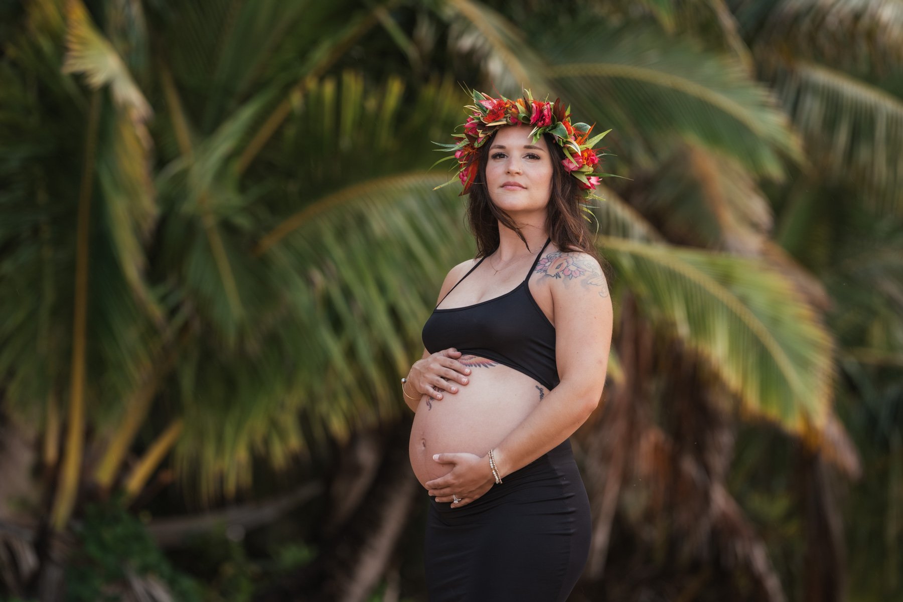 Maternity photography of expecting mother in jungle of Kauai