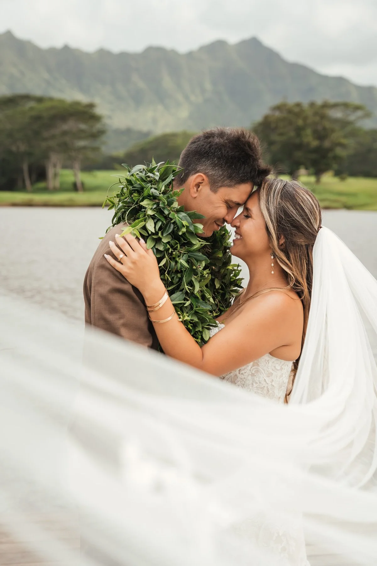 Wedding photography on the North Shore of Kauai. Kilauea waterfall is the perfect place for a small wedding and elopement photography in Hawaii for the romantic and adventurous couple with its gorgeous jungle scenes and a beautiful waterfall that cap