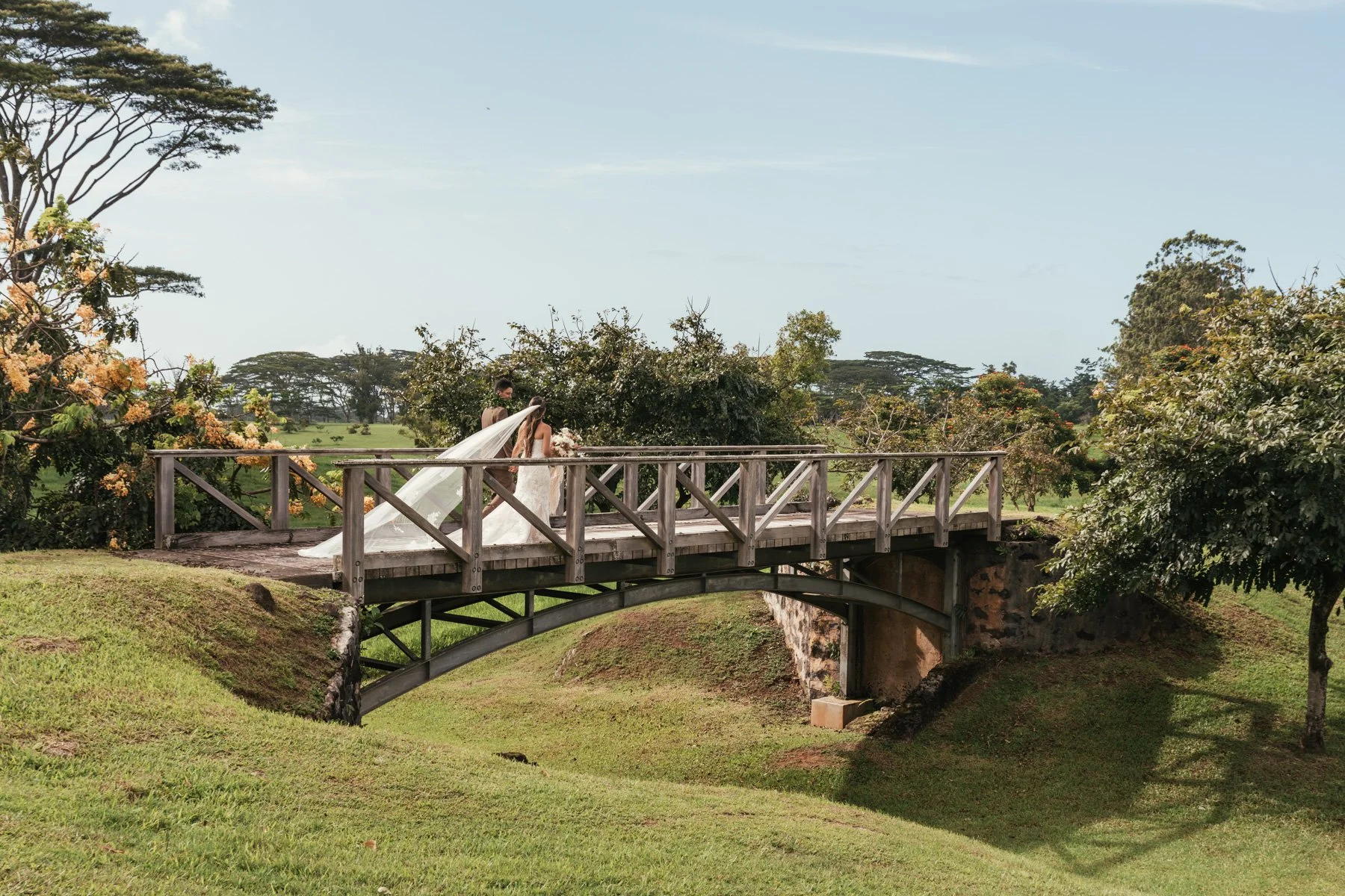 Wedding photography on the North Shore of Kauai. Kilauea waterfall is the perfect place for a small wedding and elopement photography in Hawaii for the romantic and adventurous couple with its gorgeous jungle scenes and a beautiful waterfall that cap