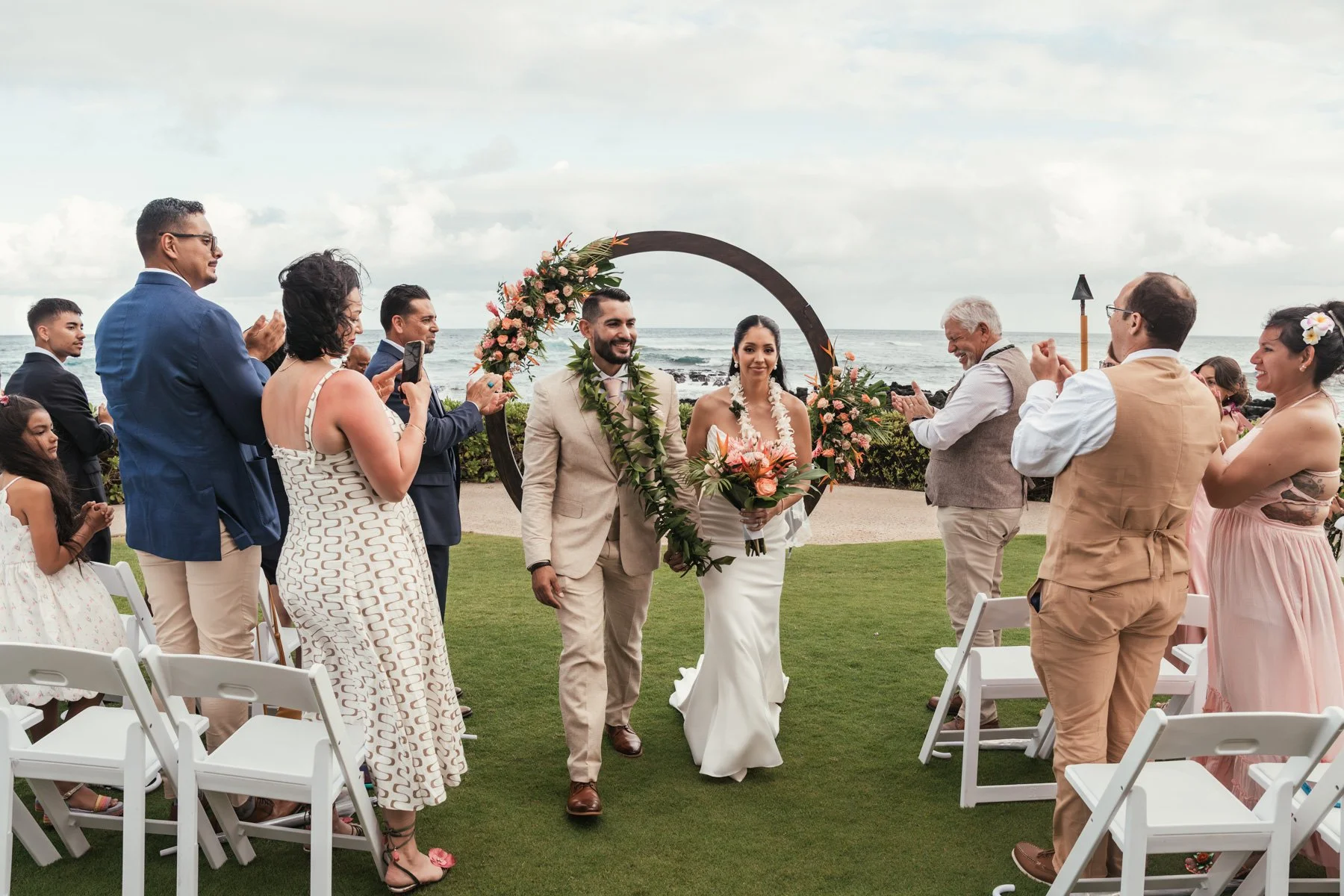 Bride and groom exit ceremony area at Sheraton Kauai Resort