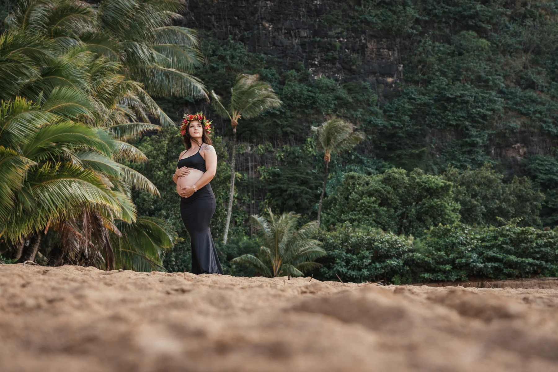 Maternity photography of expecting mother in jungle of Kauai