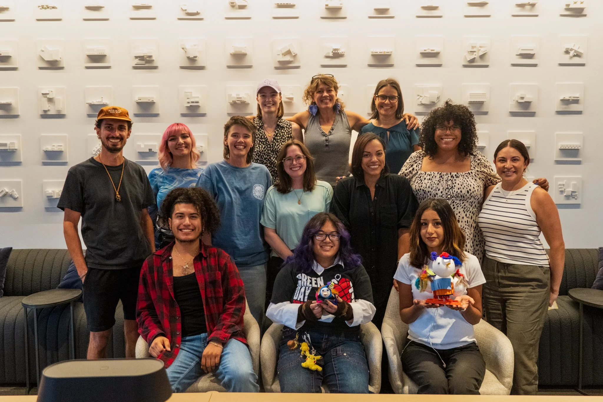 Board members in a group photo at OZ Architecture at the Board Retreat in August 2026