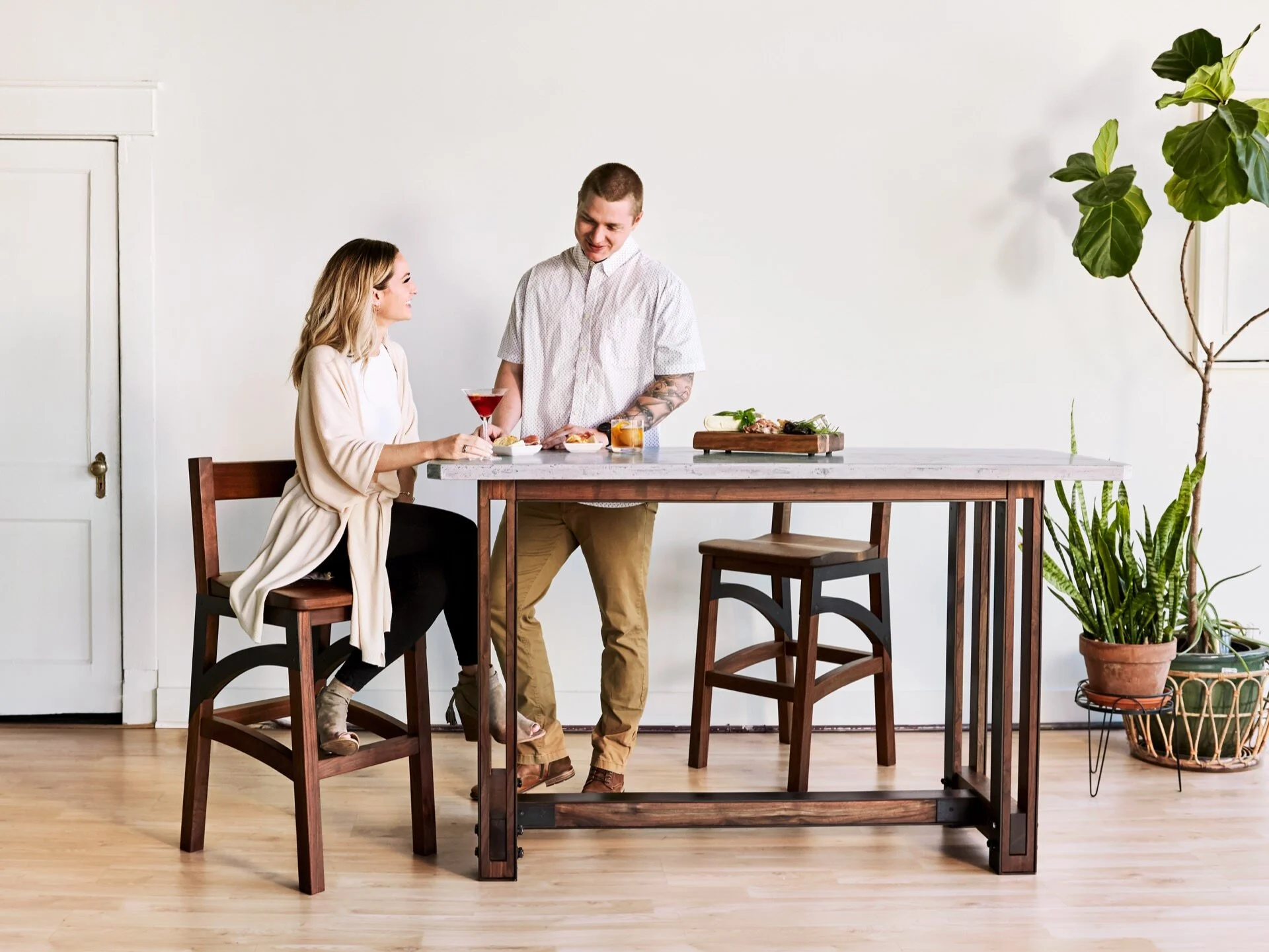 Custom bar stools perfect for entertaining for dinner parties and family gatherings. Low-back chairs combine handcrafted woodworking with custom metalwork to produce modern chairs with a contemporary flair. Handmade in Richmond, VA. Custom concrete f
