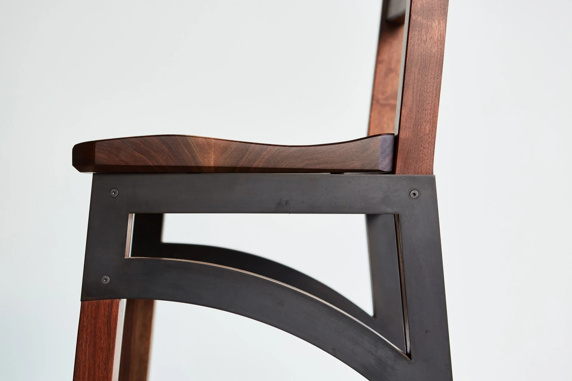 Custom bar stools perfect for entertaining for dinner parties and family gatherings. Low-back chairs combine handcrafted woodworking with custom metalwork to produce modern chairs with a contemporary flair. Handmade in Richmond, VA. Custom concrete f