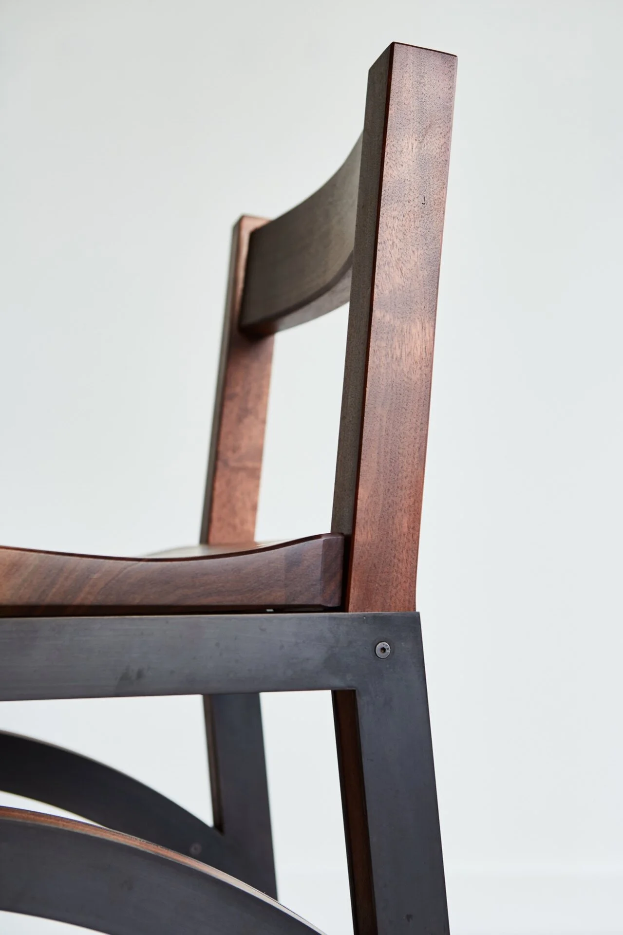 Custom bar stools perfect for entertaining for dinner parties and family gatherings. Low-back chairs combine handcrafted woodworking with custom metalwork to produce modern chairs with a contemporary flair. Handmade in Richmond, VA. Custom concrete f