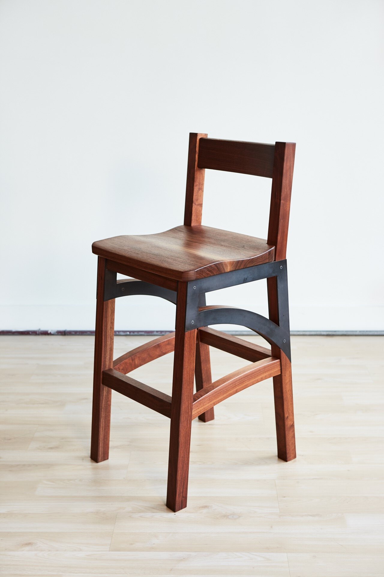 Custom bar stools perfect for entertaining for dinner parties and family gatherings. Low-back chairs combine handcrafted woodworking with custom metalwork to produce modern chairs with a contemporary flair. Handmade in Richmond, VA. Custom concrete f