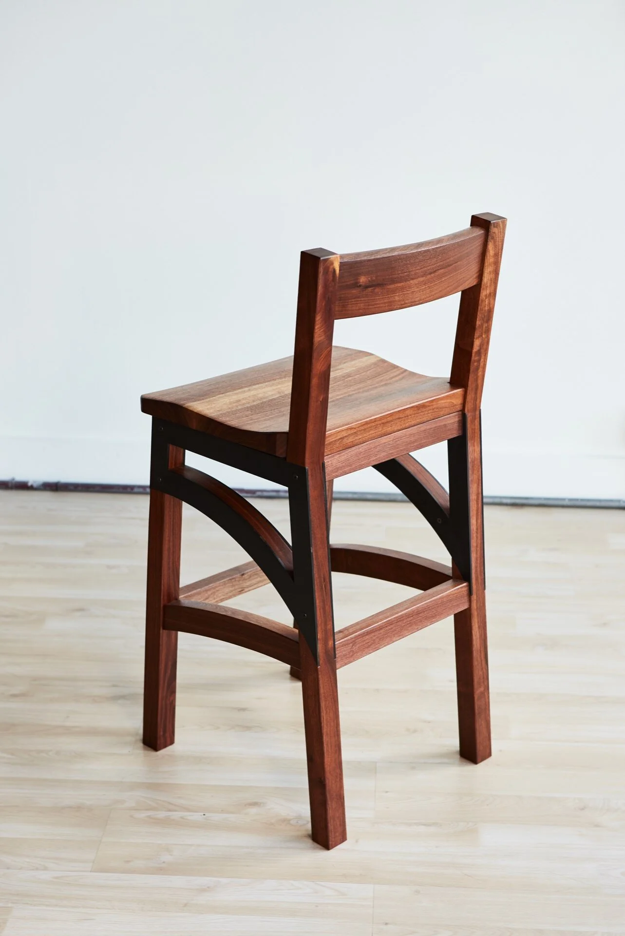 Custom bar stools perfect for entertaining for dinner parties and family gatherings. Low-back chairs combine handcrafted woodworking with custom metalwork to produce modern chairs with a contemporary flair. Handmade in Richmond, VA. Custom concrete f