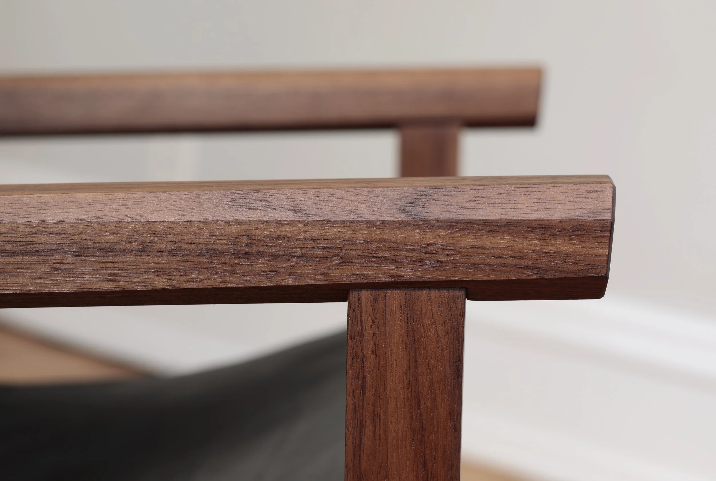 Combining the warmth of wood and the luxury of leather, this sling chair is the perfect place to spend an evening of relaxation. A collaboration between Alicia Dietz Studios and Awl Snap Leather, both women-owned business in Richmond, VA. A low and d