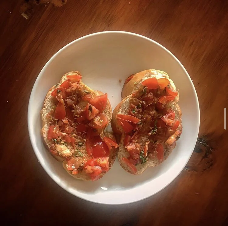 Bruschetta - Pepper, Thyme, & Tomatoes sauteed with garlic and splashed with balsamic vinegar, mixed with fresh oregano, lemon juice, and a couple pieces of toasted french bread.  