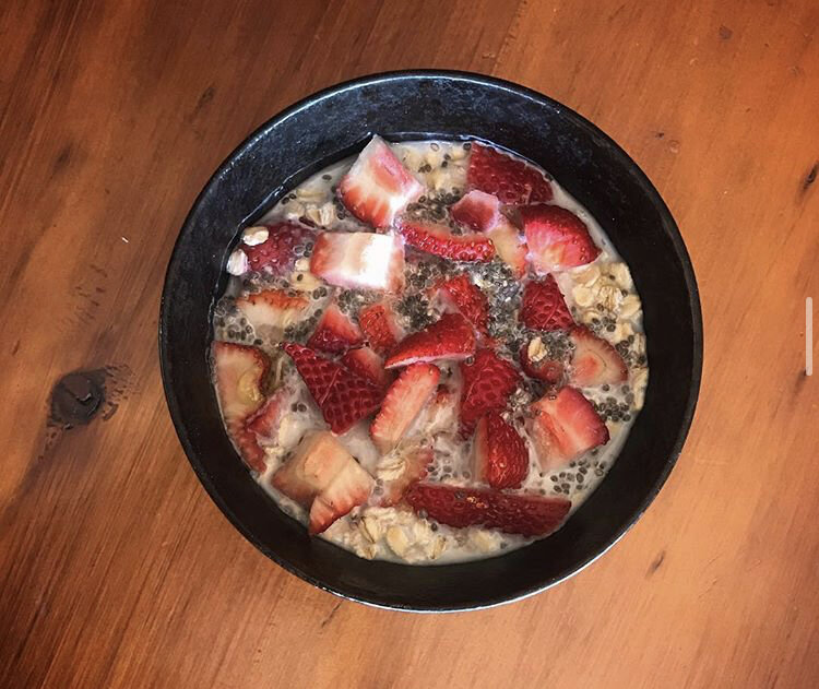 Overnight Oats (soaked with almond milk), Strawberries, honey, & chia seeds 