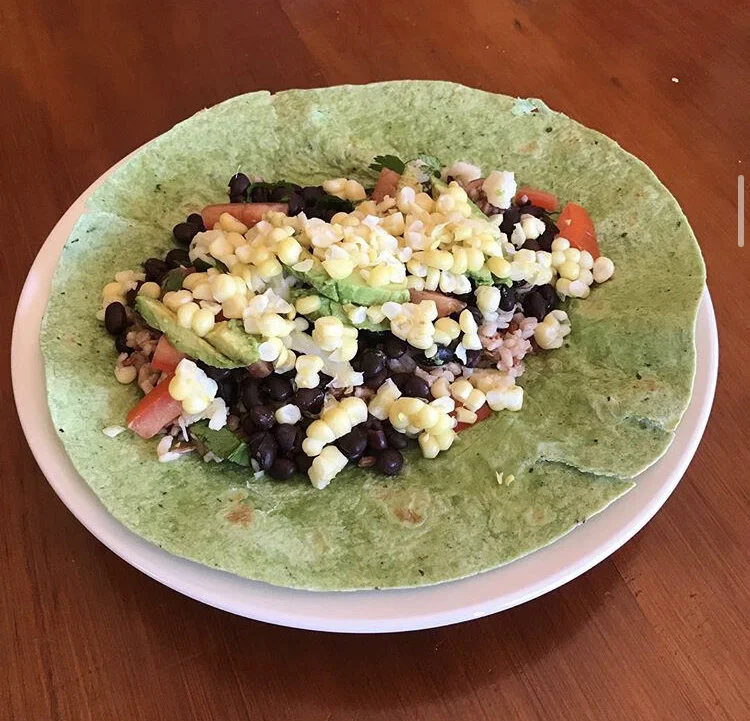 Spinach Wrap Burrito - Wild Rice, Corn, Dairy Free Cheese, Avocado, Black beans, Tomatoes, Cilantro, Green Salsa 
