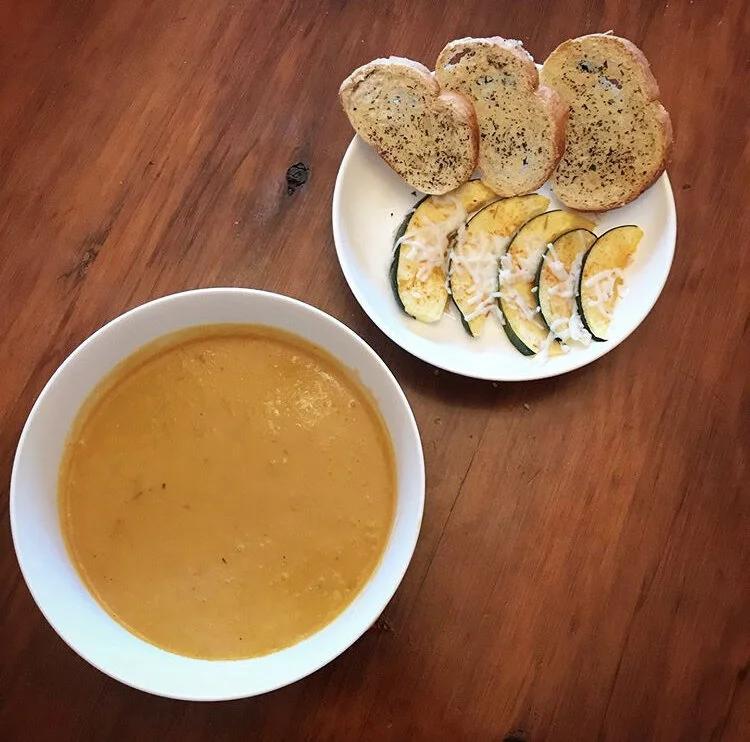 Vegan Potato Cheddar Soup, baked zucchini, and garlic parmesan bread