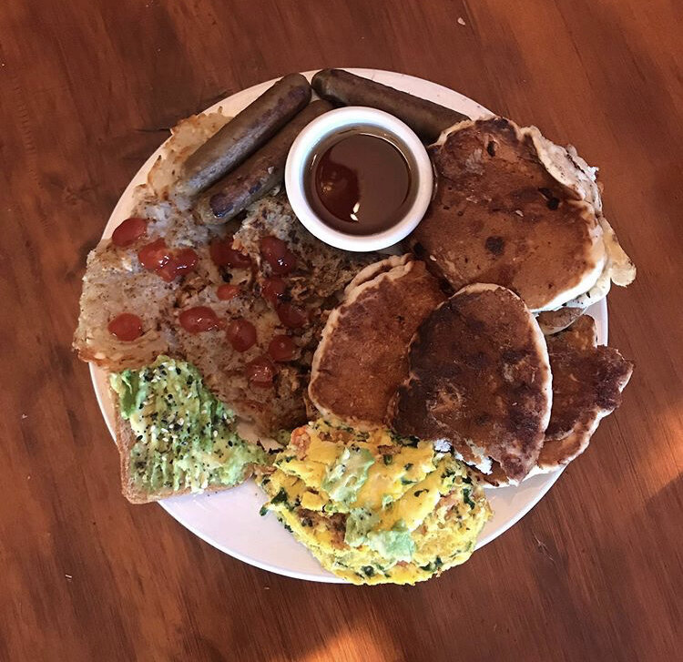 Vegan Sausage, Hashbrowns, Chocolate Chip pancakes, spinach/tomato/egg/dairy free cheese omelette & avocado on toast 